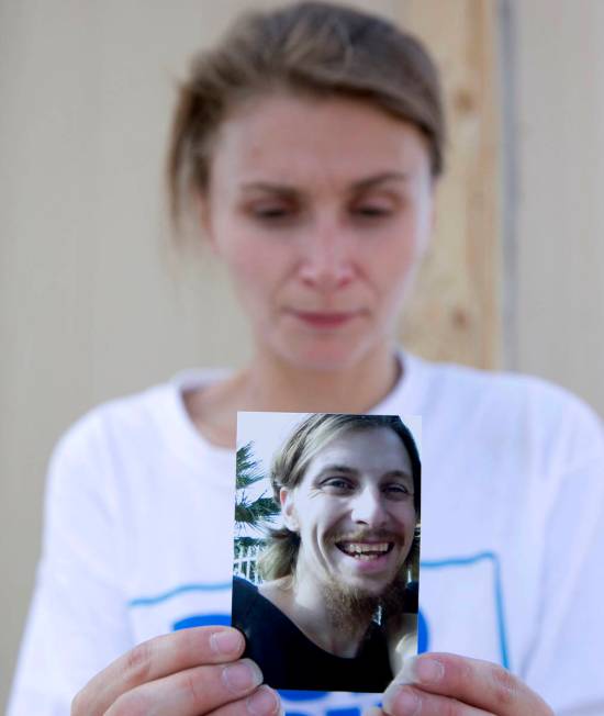 Samantha Squires holds a photograph of her brother, Joshua, at the Storeyville Manufactured Hom ...