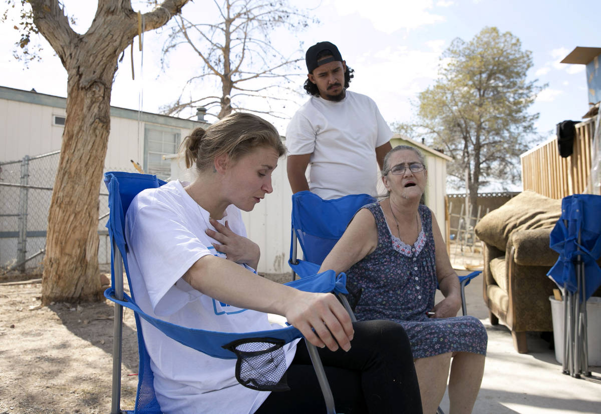 Samantha Squires, left, pauses as she speaks about her brother, Joshua, who was killed by polic ...