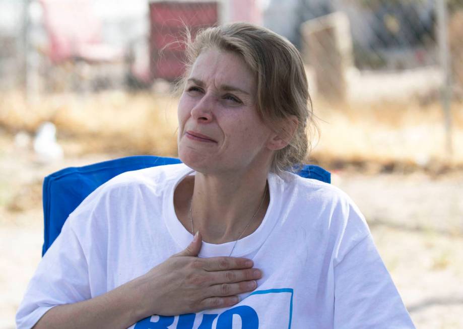 Samantha Squires pauses as she speaks about her brother, Joshua, who was killed by police after ...