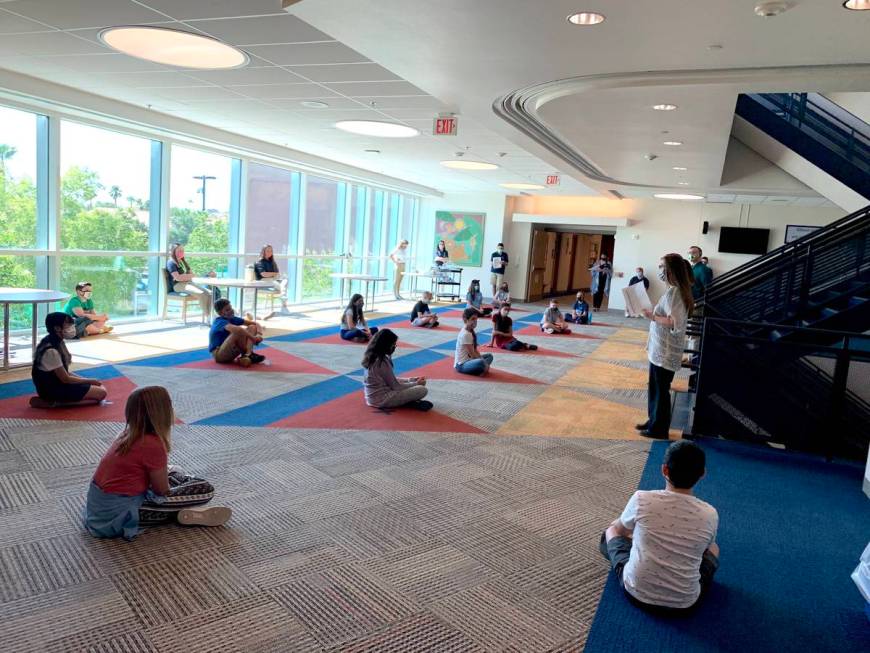 Students participate in class on the first day of school Wednesday, Aug. 12, 2020 at the Dr. Mi ...