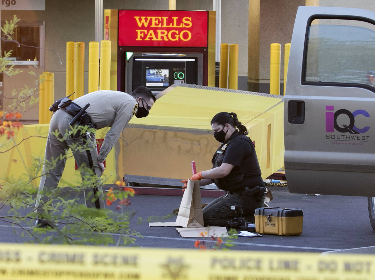 The Metropolitan Police Department investigates an apparent failed attempt to drag an ATM off i ...