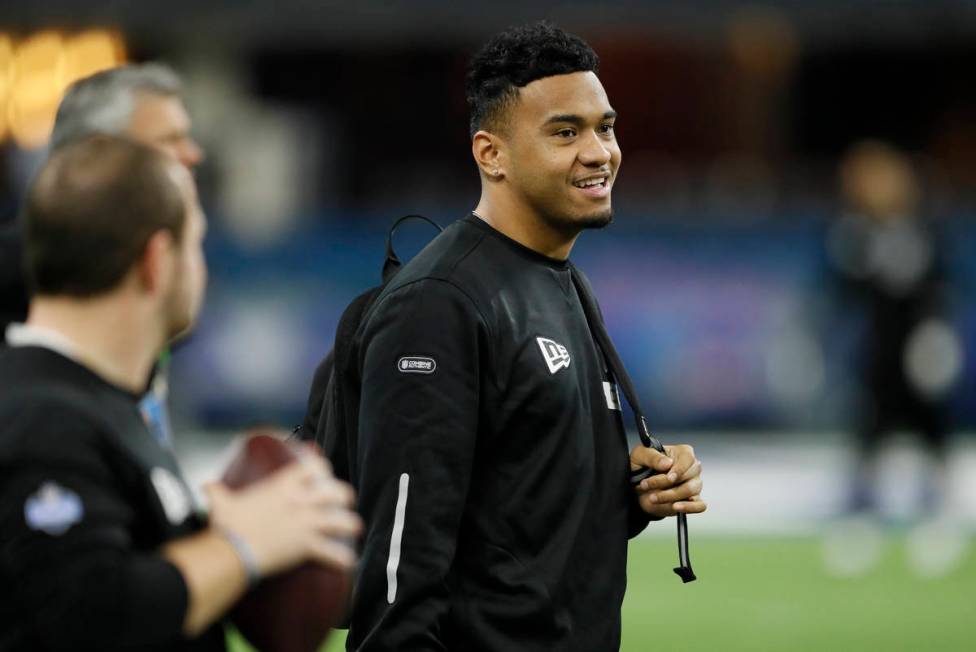 FILE - In this Feb. 27, 2020, file photo, Alabama quarterback Tua Tagovailoa watches a drill at ...