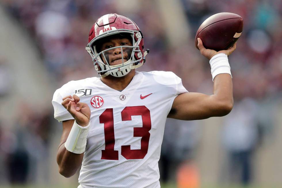 FILE - In this Oct. 12, 2019, file photo, Alabama quarterback Tua Tagovailoa passes against Tex ...