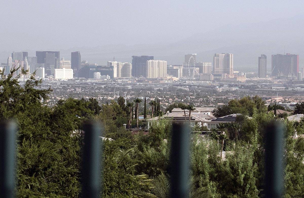 A haze hangs over the Strip as seen from Henderson on Thursday, Aug. 13, 2020, in Las Vegas. Cl ...