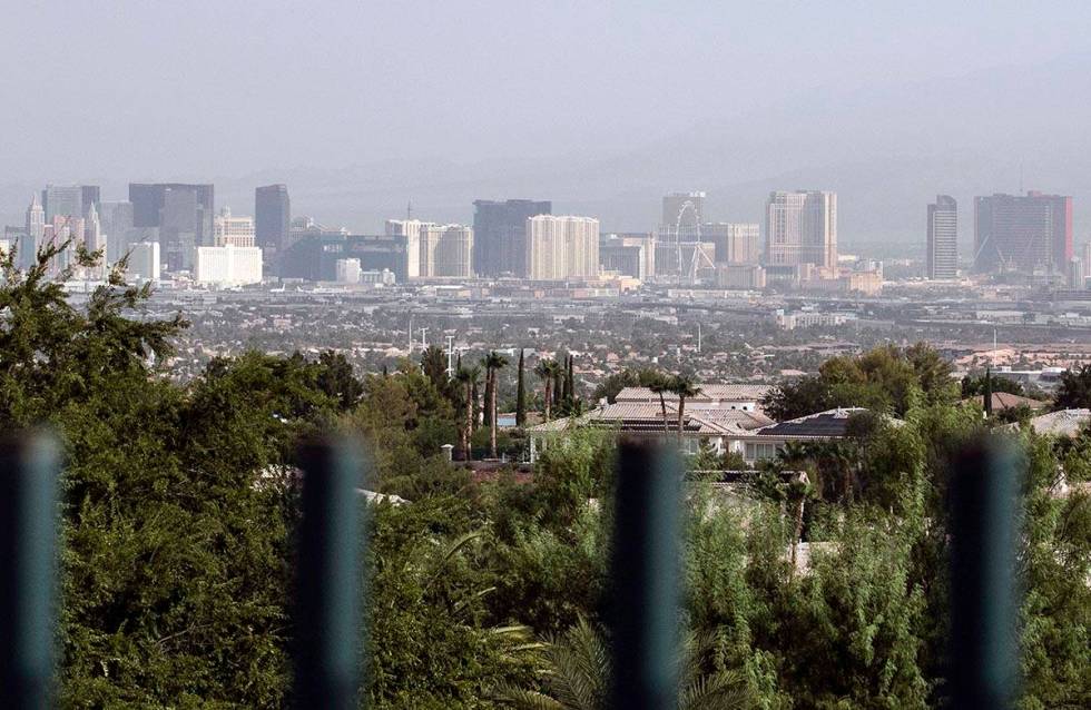 A haze hangs over the Strip as seen from Henderson on Thursday, Aug. 13, 2020, in Las Vegas. Cl ...