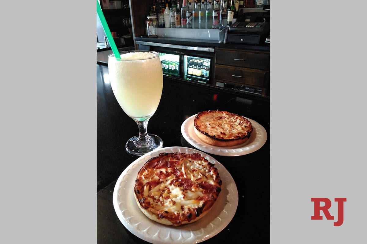 Don't Tell Mama's new frozen margarita-pizza combo, available when the club reopens Friday, Aug ...