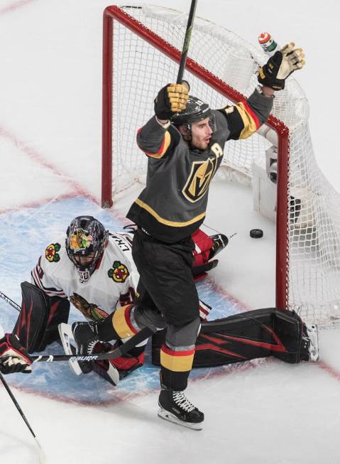 Vegas Golden Knights' Reilly Smith (19) scores on Chicago Blackhawks goalie Corey Crawford (50) ...