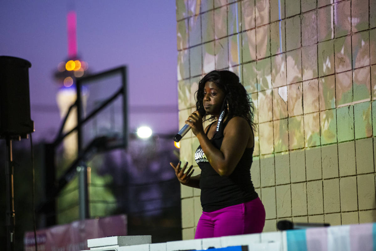 Nicole Williams, of Vegas Urban Pride, speaks during a candlelight vigil, in remembrance of the ...