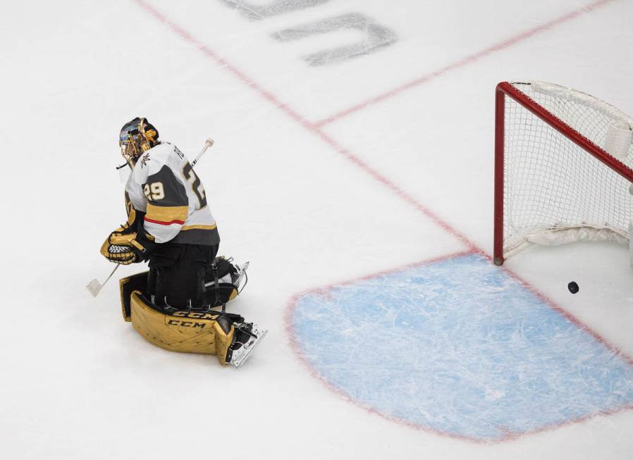 Vegas Golden Knights goalie Marc-Andre Fleury gives up a goal to the Chicago Blackhawks during ...