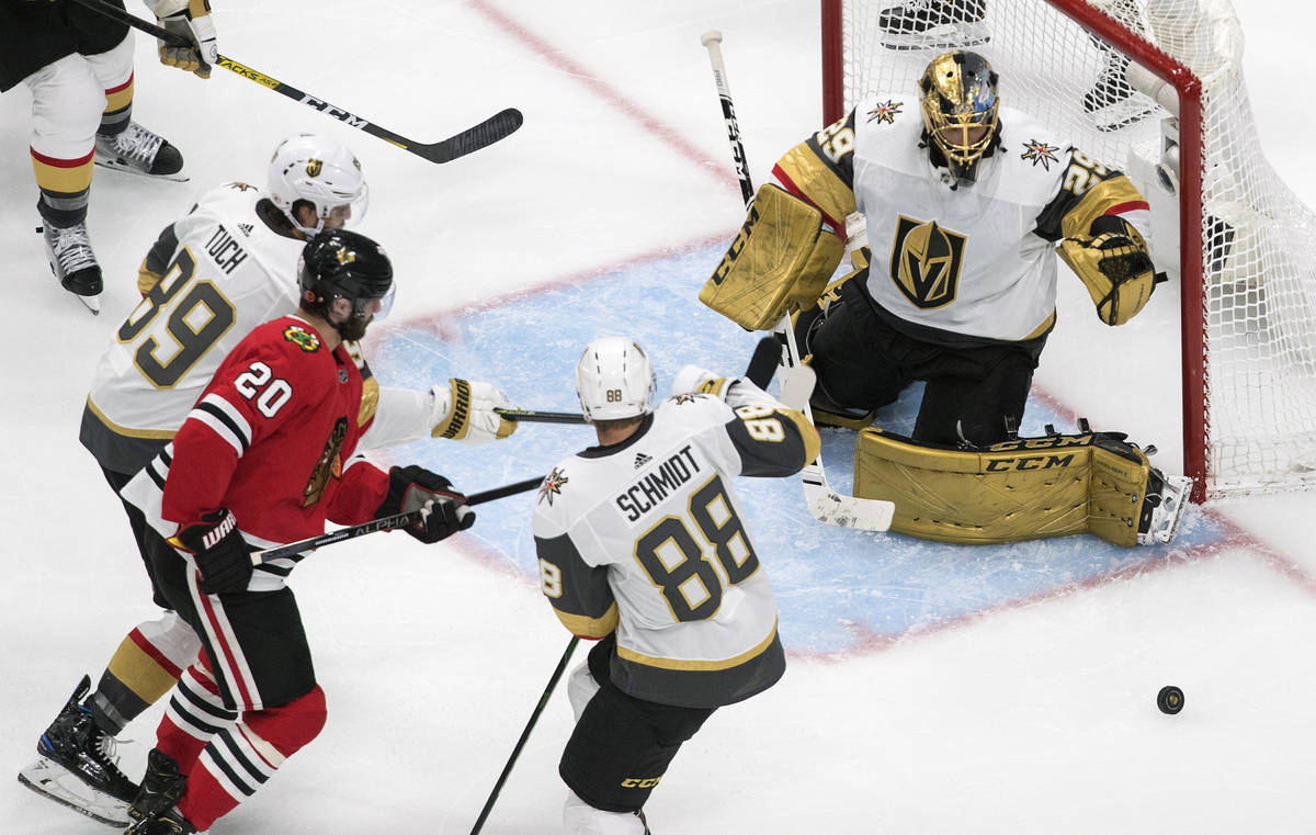 Vegas Golden Knights goalie Marc-Andre Fleury (29) makes the save on Chicago Blackhawks' Brando ...