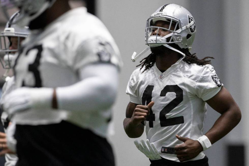 Raiders linebacker Cory Littleton (42) warms up during an NFL football training camp practice F ...