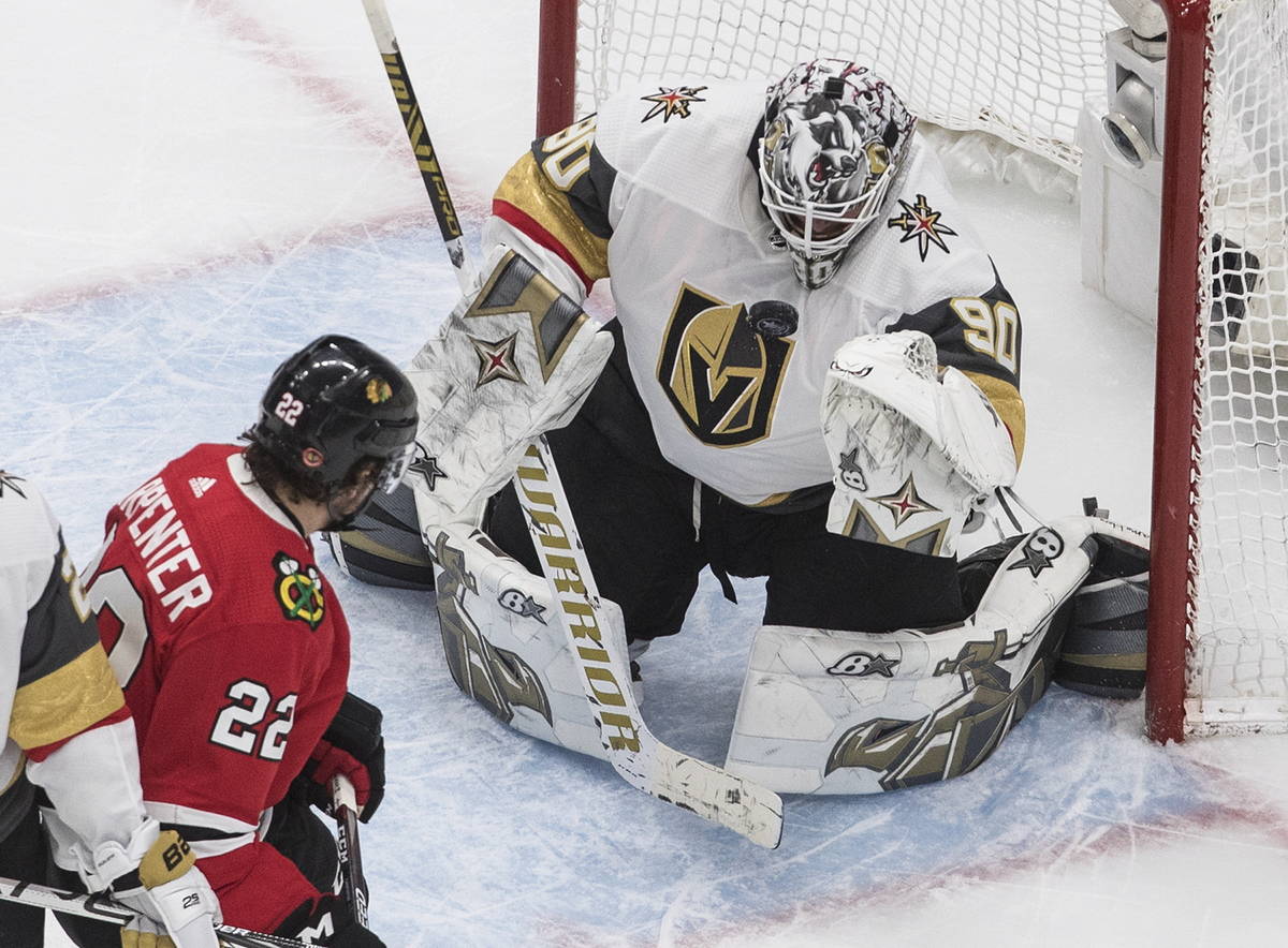 Vegas Golden Knights goalie Robin Lehner (90) makes a save on Chicago Blackhawks' Ryan Carpente ...