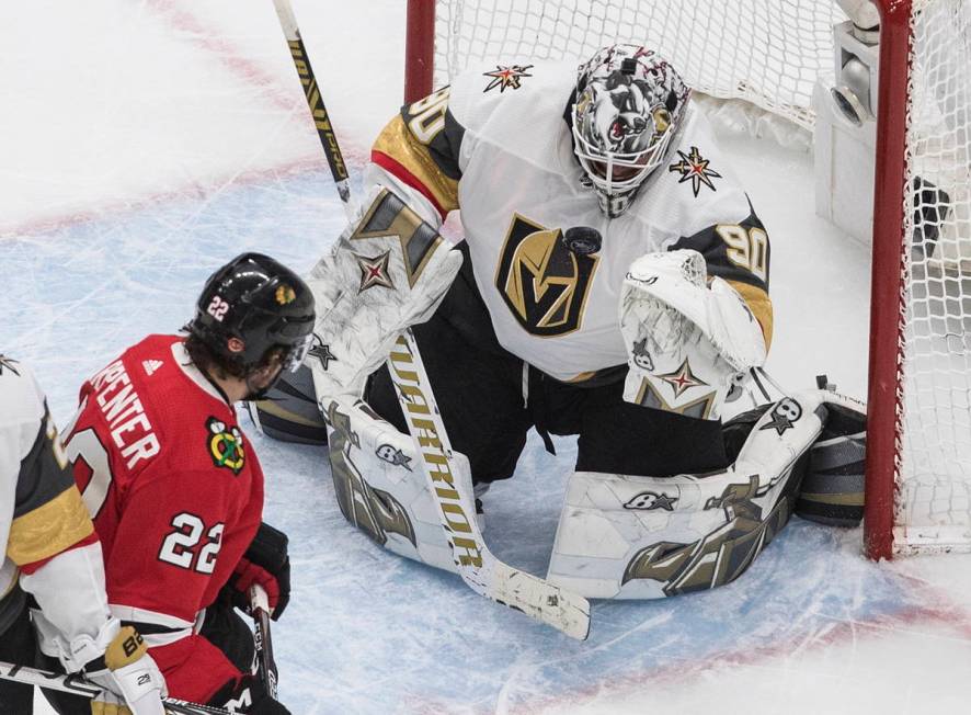 Vegas Golden Knights goalie Robin Lehner (90) makes a save on Chicago Blackhawks' Ryan Carpente ...