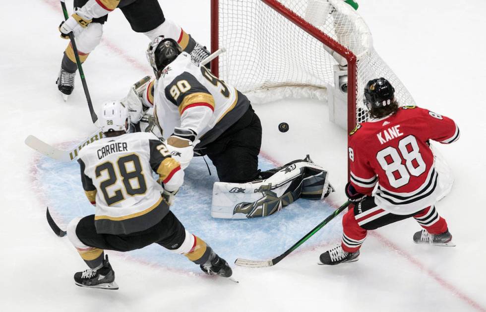 Vegas Golden Knights goalie Robin Lehner (90) is scored against as Chicago Blackhawks' Patrick ...