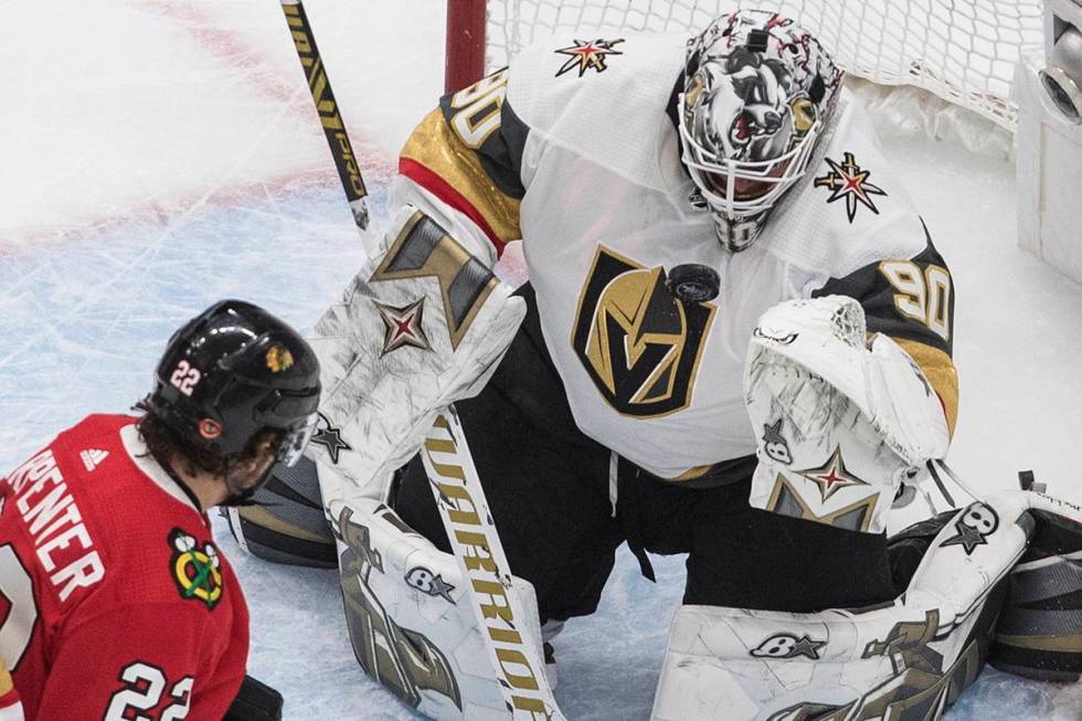 Vegas Golden Knights goalie Robin Lehner (90) makes a save on Chicago Blackhawks' Ryan Carpente ...