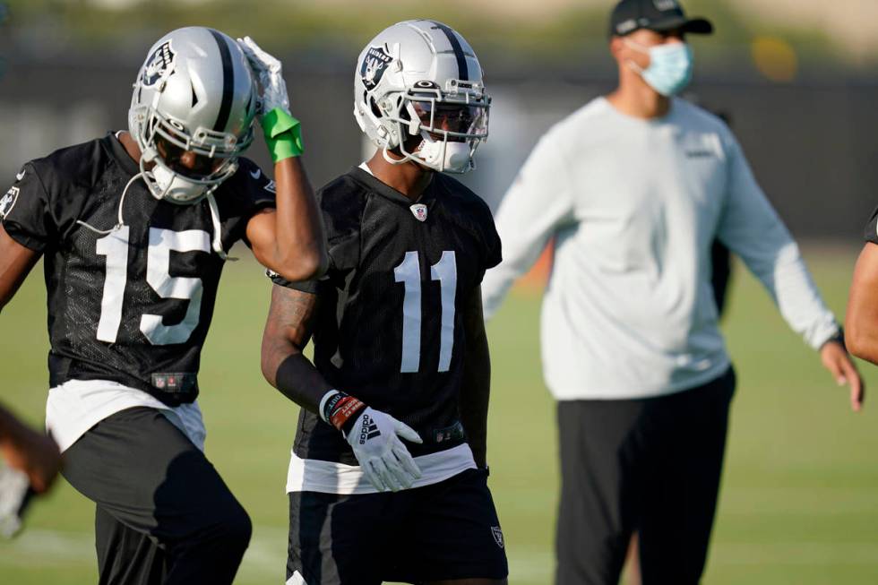 Las Vegas Raiders wide receiver Henry Ruggs III (11) attends an NFL football training camp prac ...