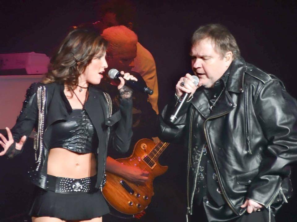Cian Coey and Meat Loaf are shown at Planet Hollywood in 2014. Coey has helped organize the WE/ ...