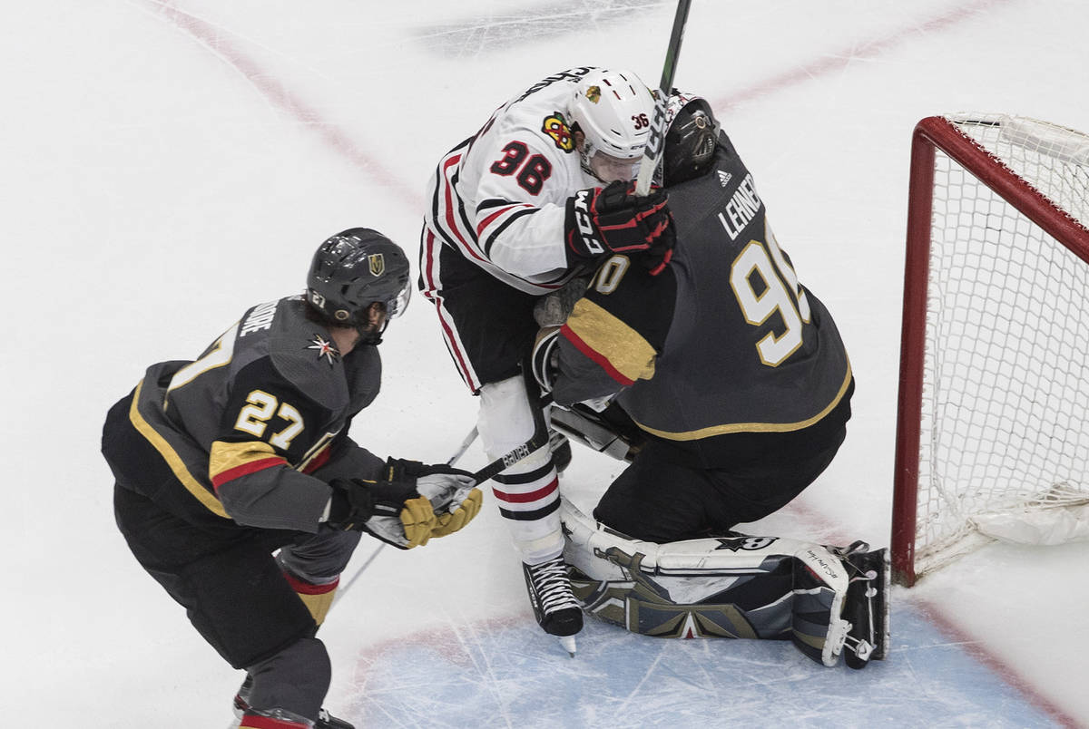 Vegas Golden Knights' Alex Tuch (89) scores on Chicago Blackhawks' goalie Corey Crawford (50) a ...