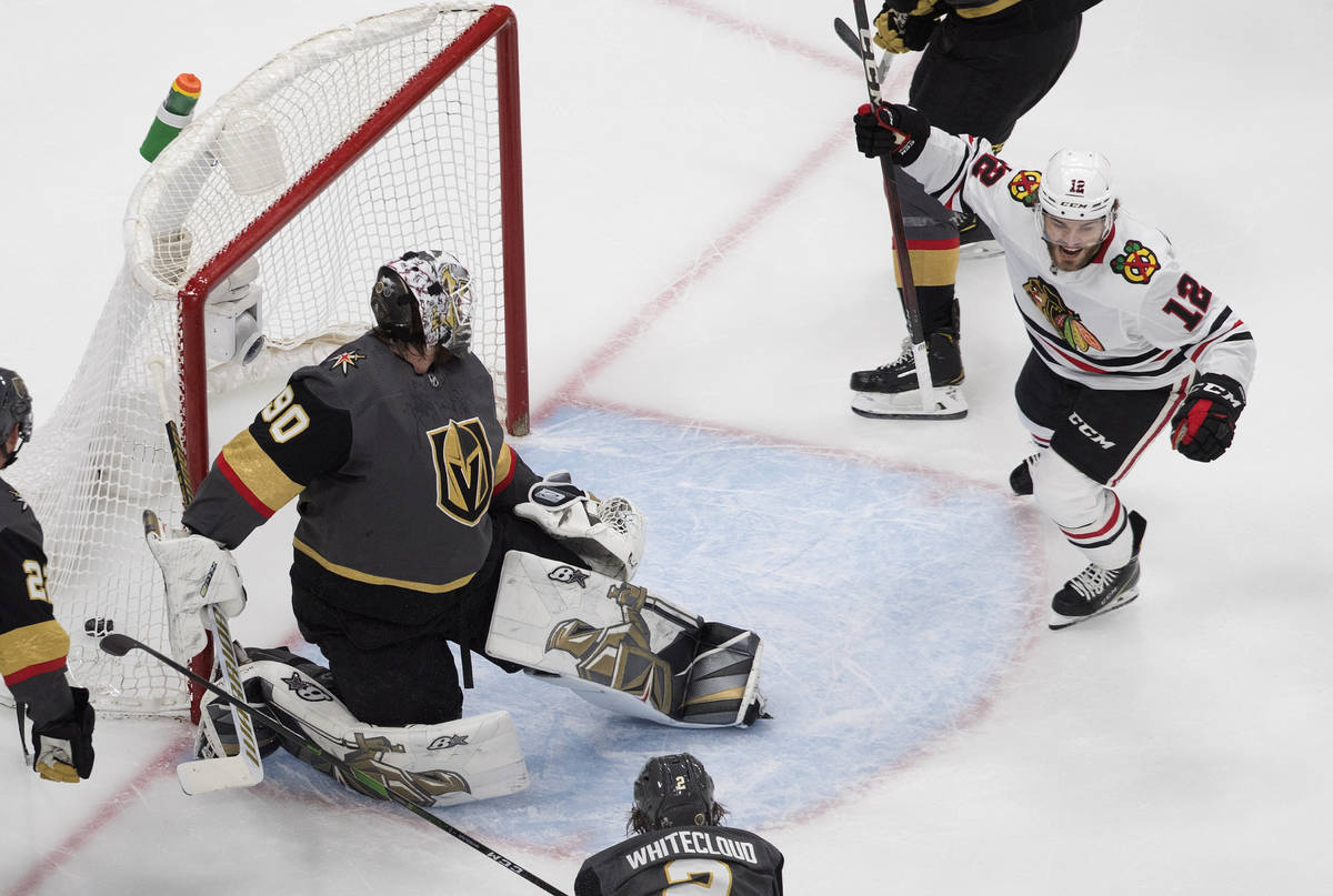 Vegas Golden Knights goalie Robin Lehner (90) is scored on by Chicago Blackhawks' Alex DeBrinca ...