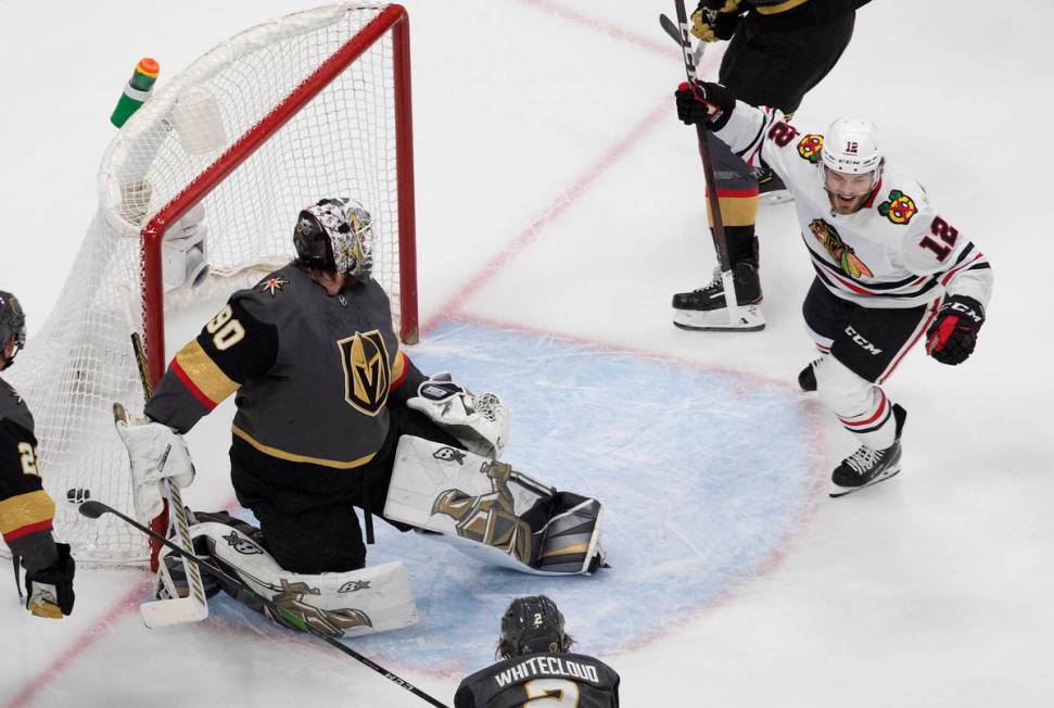 Vegas Golden Knights goalie Robin Lehner (90) is scored on by Chicago Blackhawks' Alex DeBrinca ...