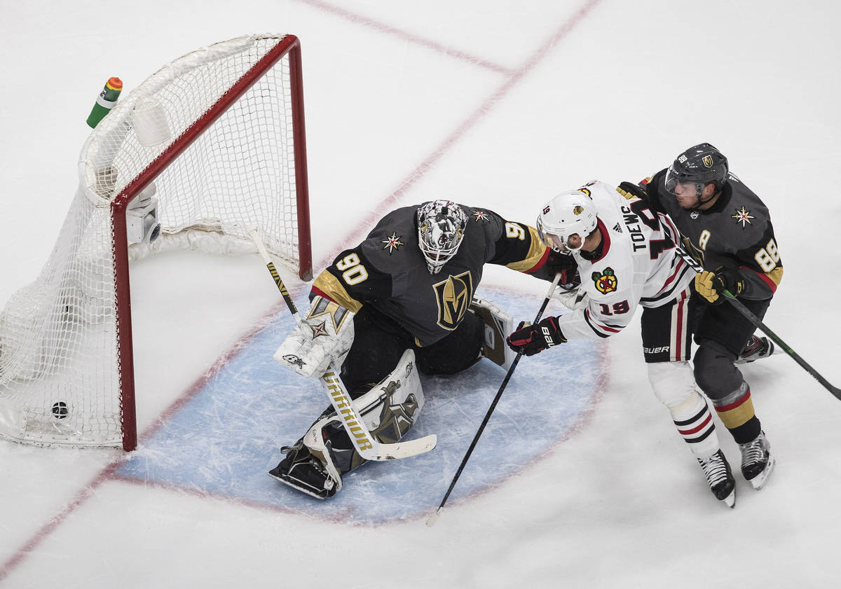 Vegas Golden Knights goalie Robin Lehner (90) gives up a goal to Chicago Blackhawks' Jonathan T ...