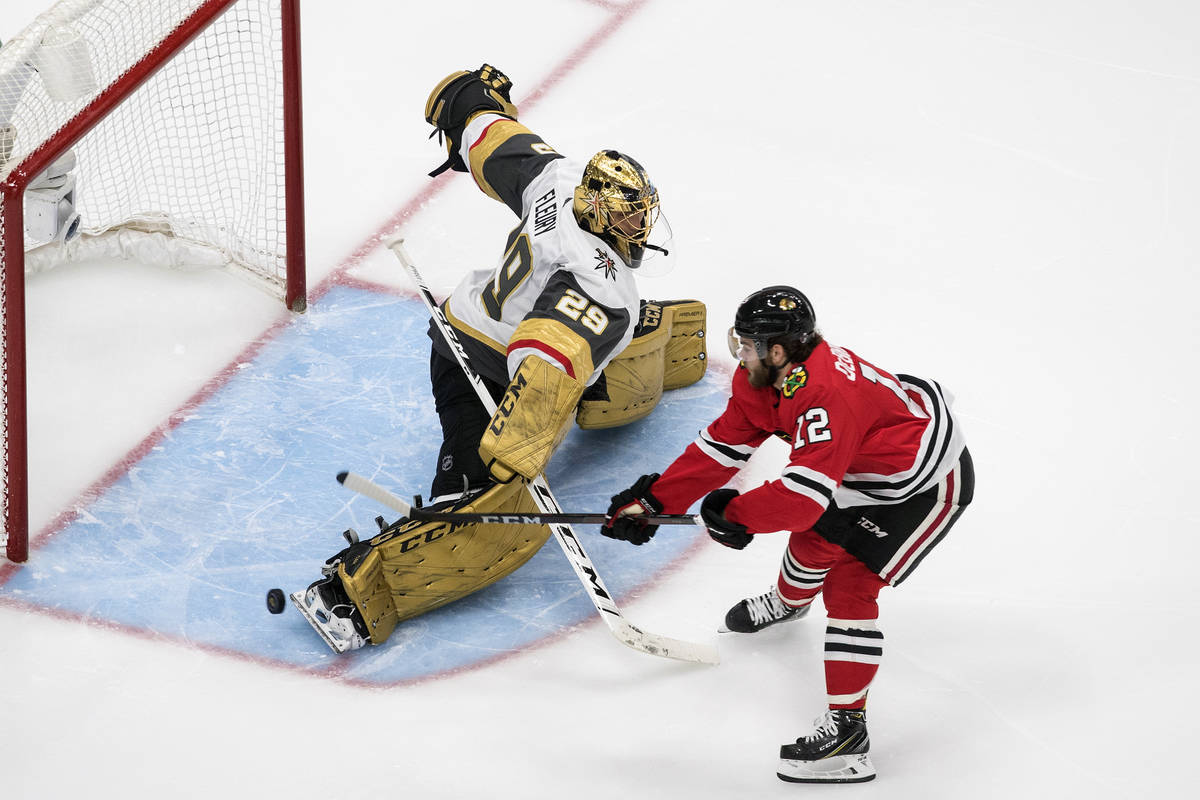 Vegas Golden Knights goalie Marc-Andre Fleury (29) makes the save on Chicago Blackhawks' Alex D ...