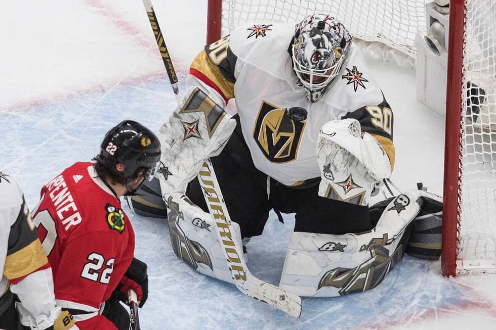 Vegas Golden Knights goalie Robin Lehner (90) makes a save on Chicago Blackhawks' Ryan Carpente ...