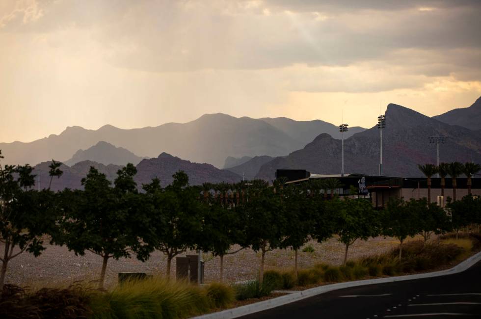 Clouds and rain in the distance beyond Downtown Summerlin in Las Vegas on Wednesday, Aug. 19, 2 ...