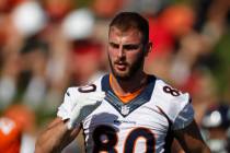 Denver Broncos tight end Jake Butt (80) takes part in drills during an NFL football training ca ...