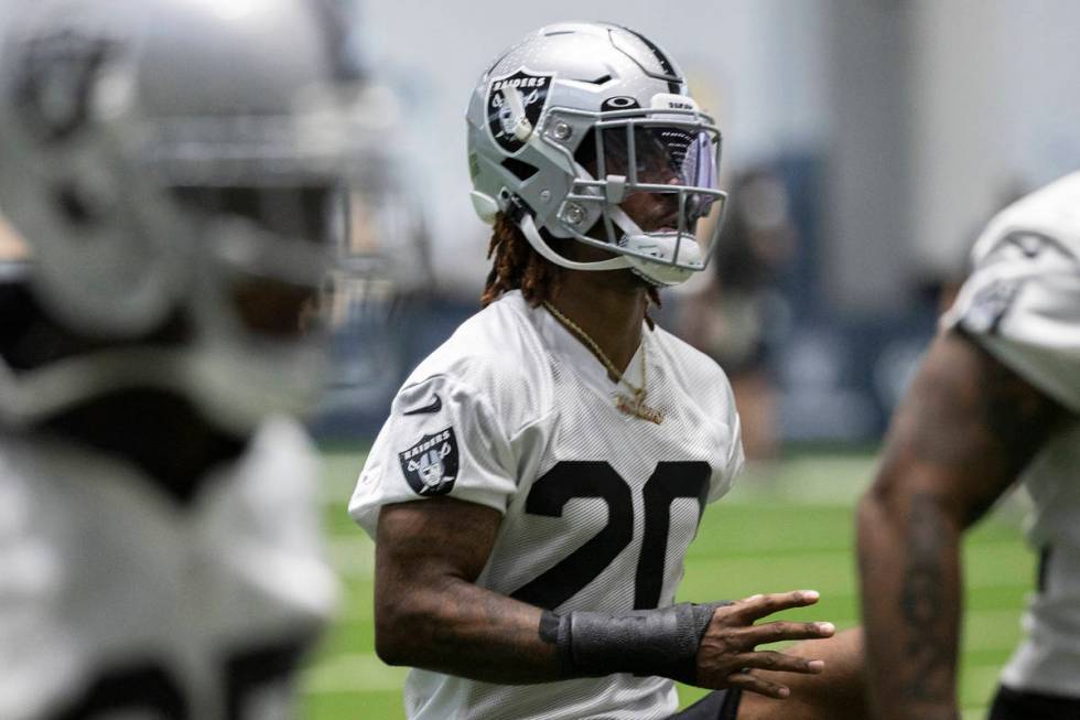 Raiders defensive back Damon Arnette (20) warms up during NFL football training camp practice o ...