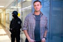 In a Dec. 26, 2019, file photo, Russian opposition leader Alexei Navalny speaks to the media in ...