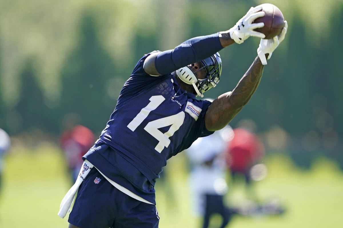 Seattle Seahawks wide receiver DK Metcalf makes a catch during NFL football training camp, Frid ...