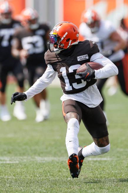 Cleveland Browns wide receiver Odell Beckham Jr. runs after a catch during practice at the NFL ...