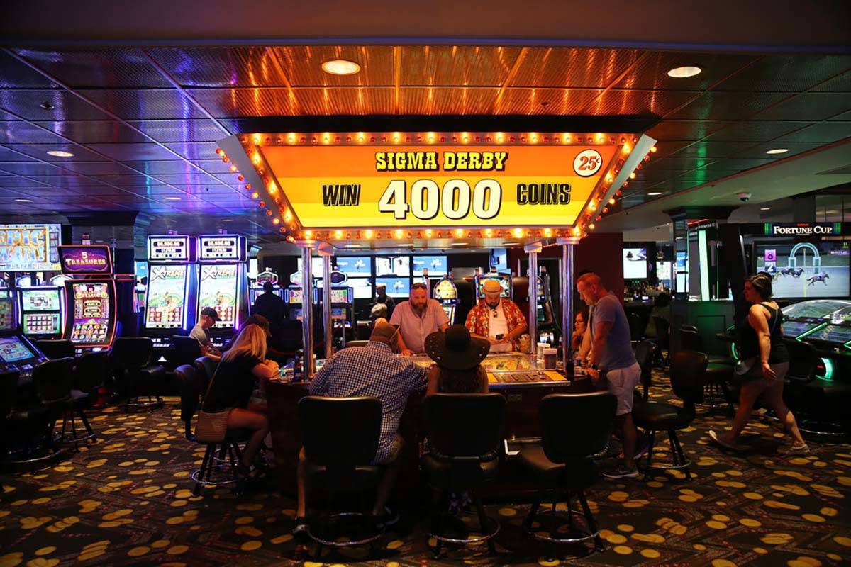 People play the Sigma Derby machine at the D Las Vegas hotel-casino in Las Vegas, Friday, Aug. ...