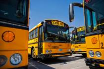 Rows of busses lay dormant at Northwest Transportation Facility on Thursday, Aug. 20, 2020, in ...