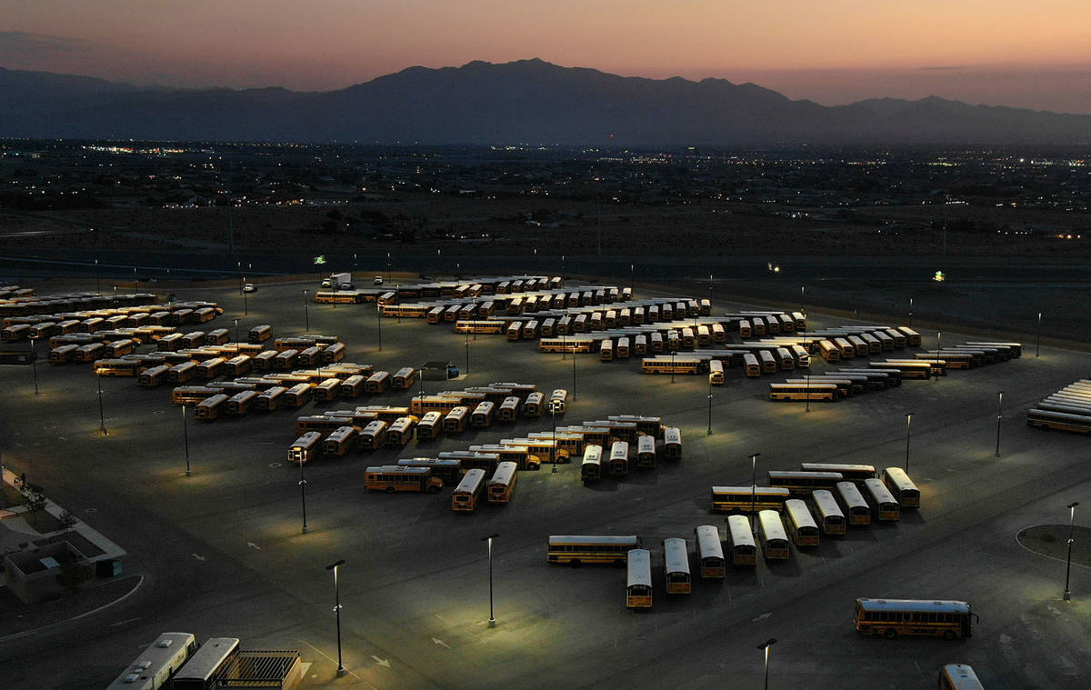 Dawn at the Clark County School District bus yard at the CCSD Northwest Transportation Facility ...