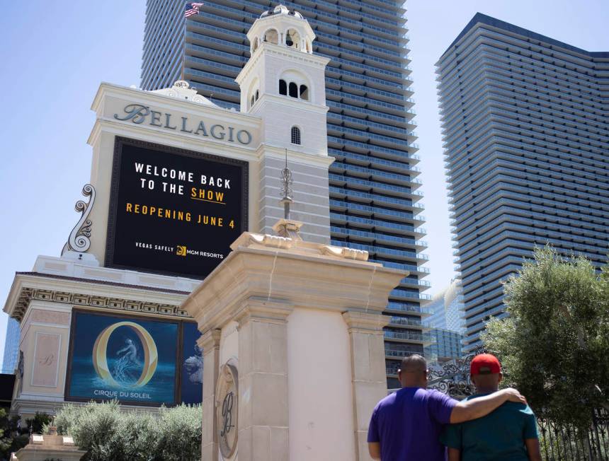 The Bellagio marquee says the hotel and casino, owned big MGM Resorts International, will open ...