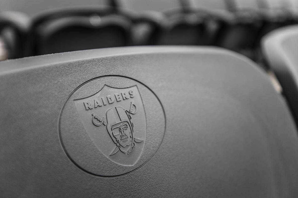 The Las Vegas Raiders logo is seen on a stadium seat at Allegiant Stadium on Friday, Aug. 21, 2 ...