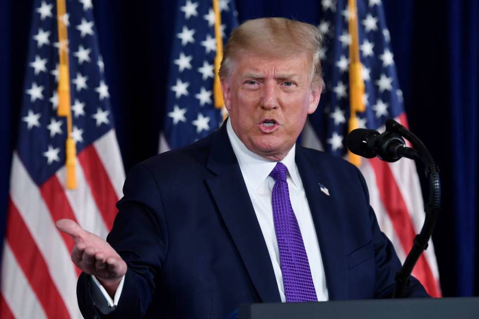 President Donald Trump speaks during a news conference at his Trump National Golf Club in Bedmi ...