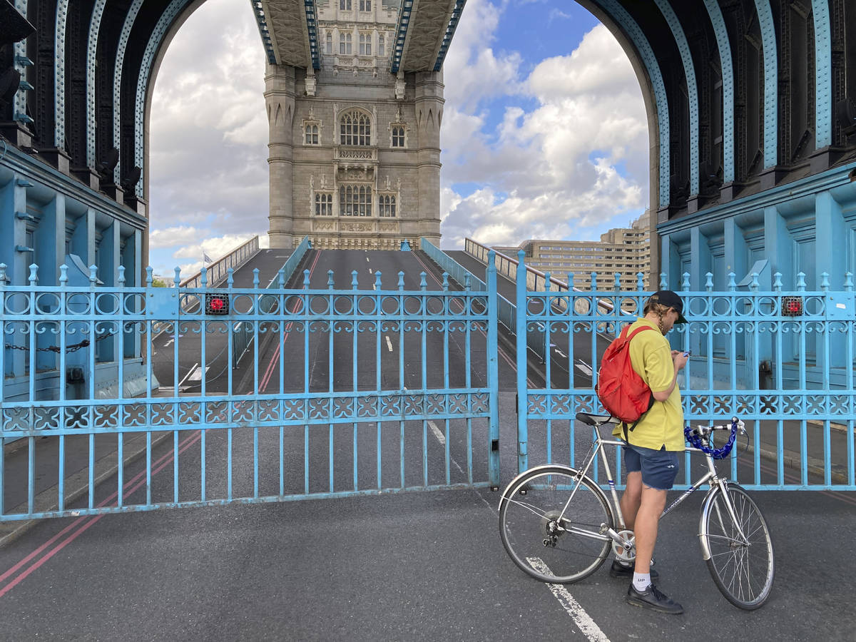 Tower Bridge crossing the River Thames is stuck open, leaving traffic in chaos as the iconic ri ...