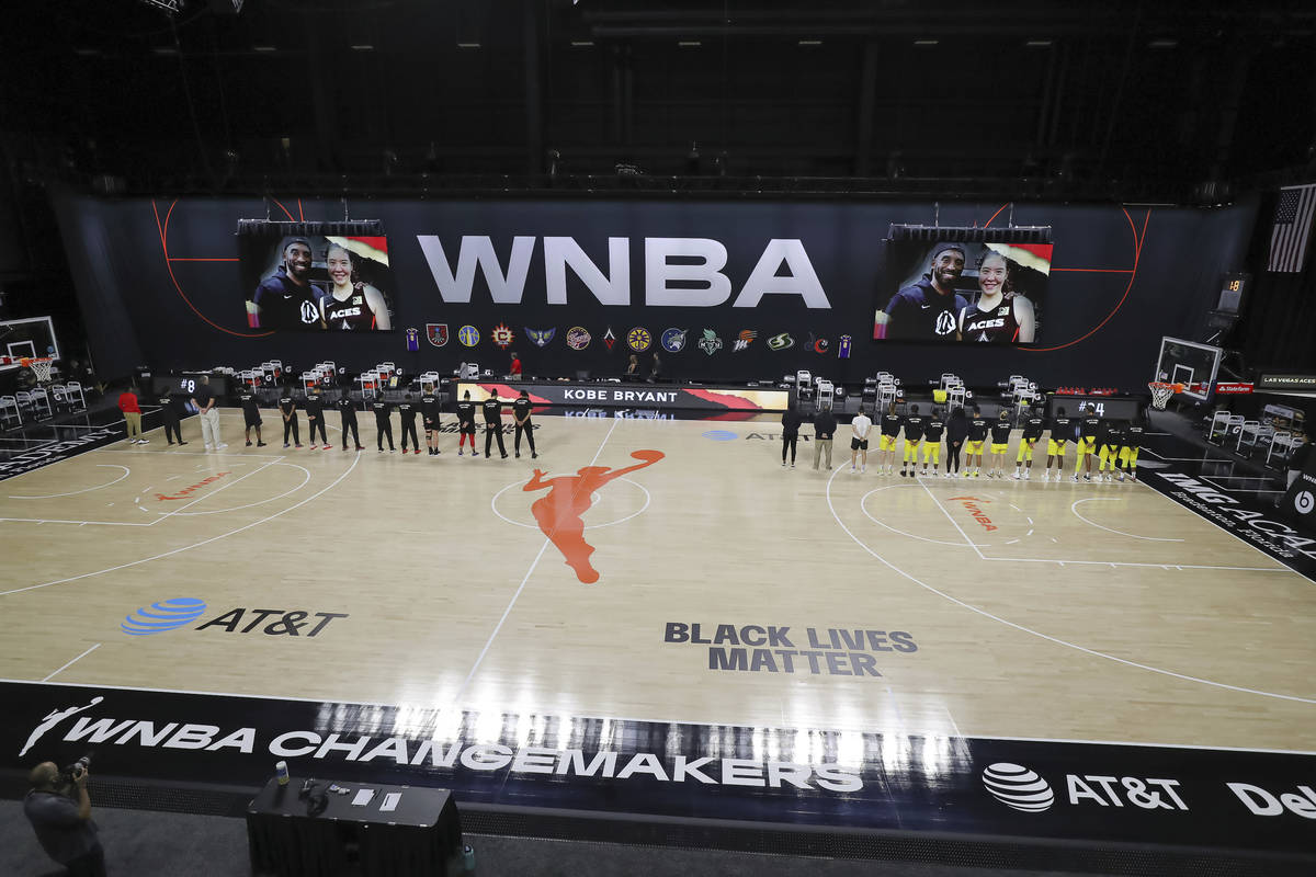 The Seattle Storm and Las Vegas Aces line up for a tribute to Kobe Bryant prior to a WNBA baske ...