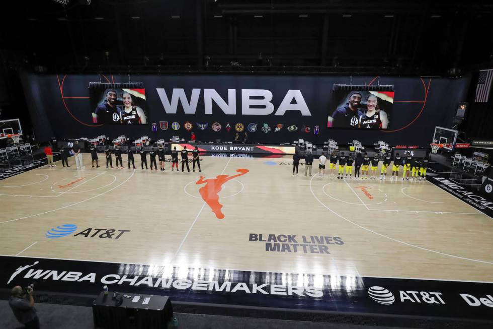 The Seattle Storm and Las Vegas Aces line up for a tribute to Kobe Bryant prior to a WNBA baske ...