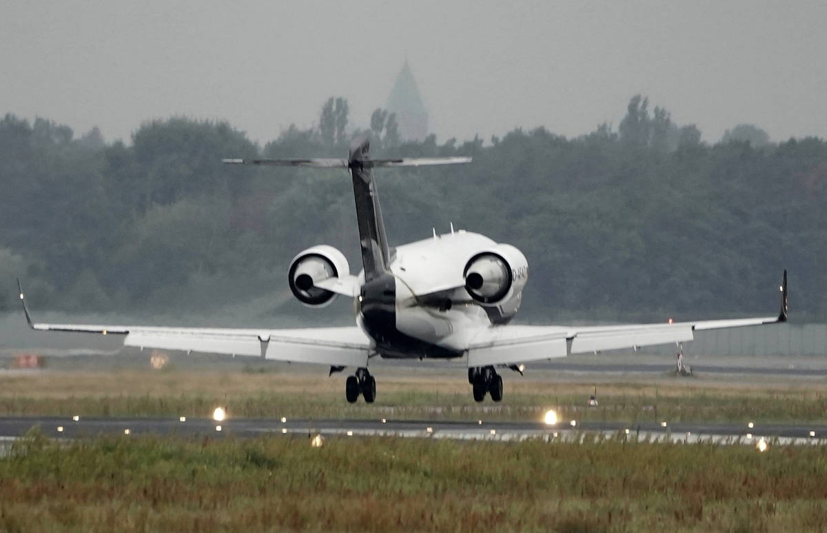 A special aircraft with the Kremlin critic Alexei Navalny lands at Tegel Airport in Berlin, Ge ...