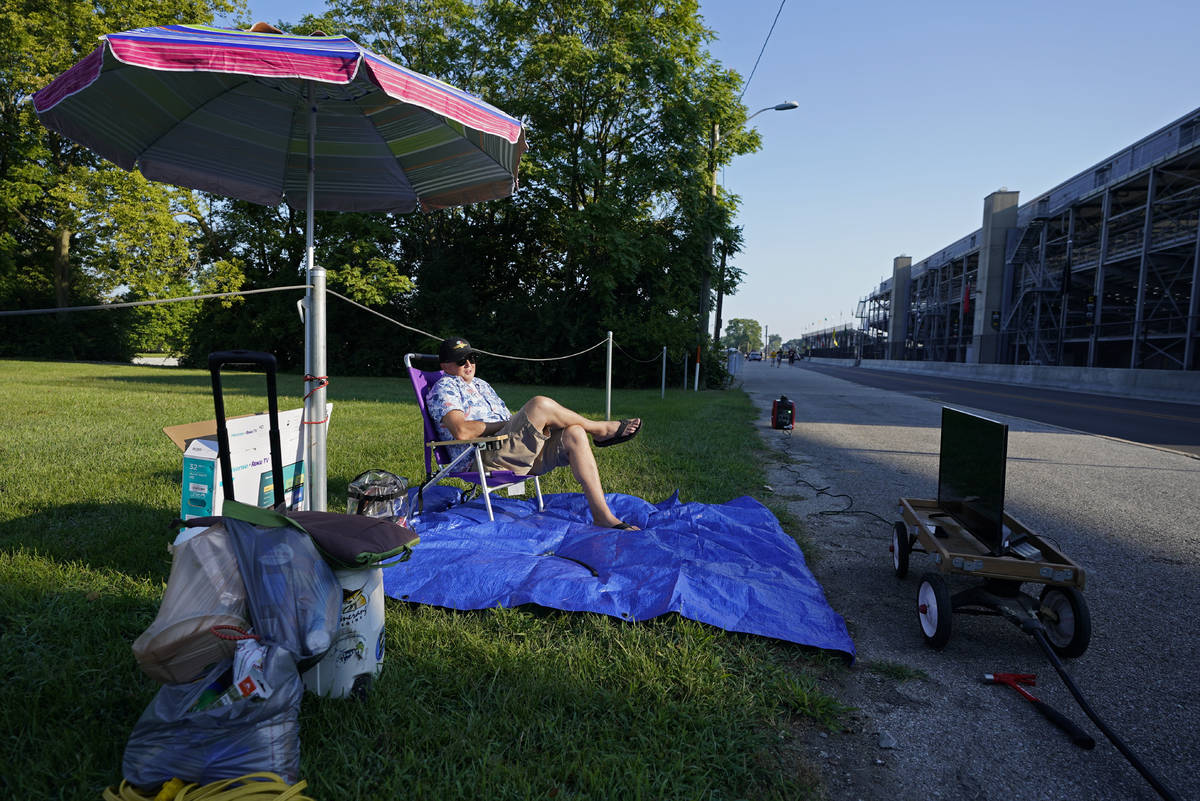 Andy Guthormsen sets up outside of the Indianapolis Motor Speedway, Sunday, Aug. 23, 2020, in I ...