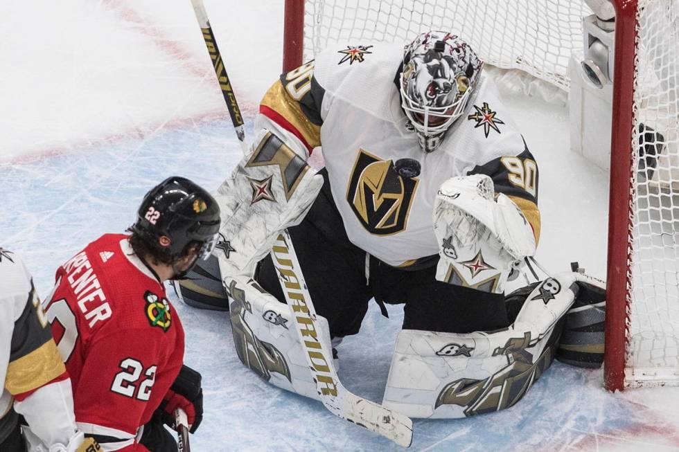 Vegas Golden Knights goalie Robin Lehner (90) makes a save on Chicago Blackhawks' Ryan Carpente ...