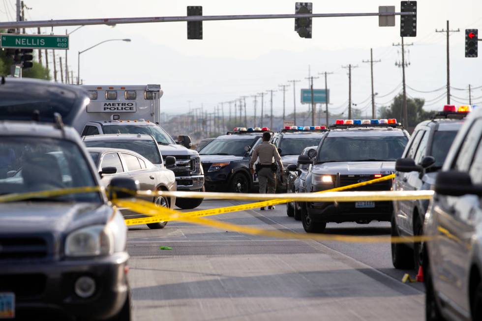 Metropolitan police investigate a homicide near the intersection of North Las Vegas Boulevard a ...