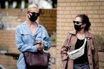 Alexei Navalny's wife Yulia, left, arrives at the Charite hospital in Berlin, Germany, Monday, ...