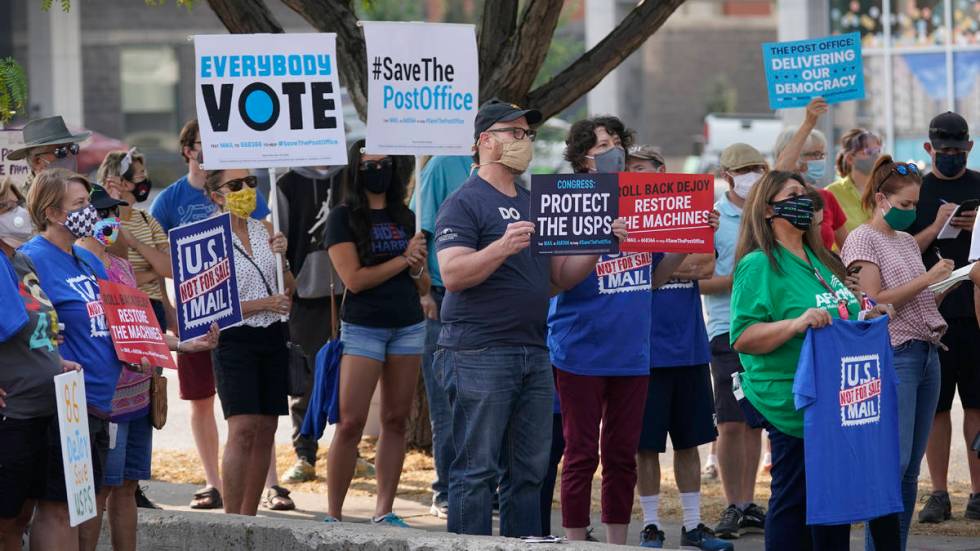 People gather during the "Save the Post Office" rally Saturday, Aug. 22, 2020, in Sal ...