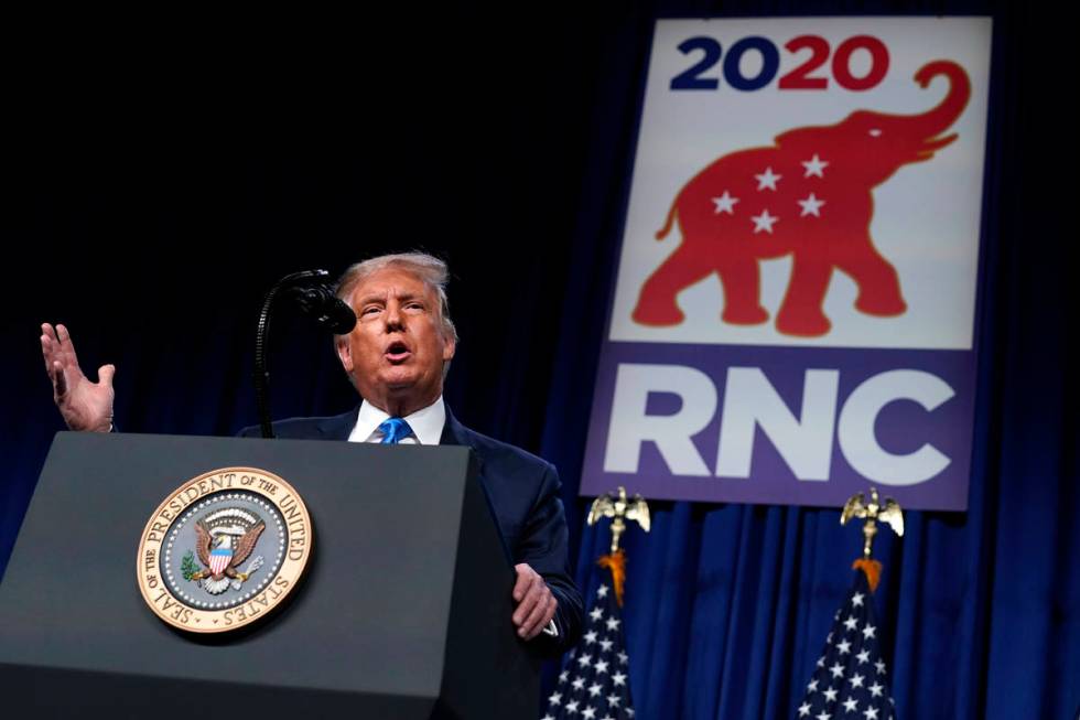 President Donald Trump speaks on stage during the first day of the Republican National Committe ...