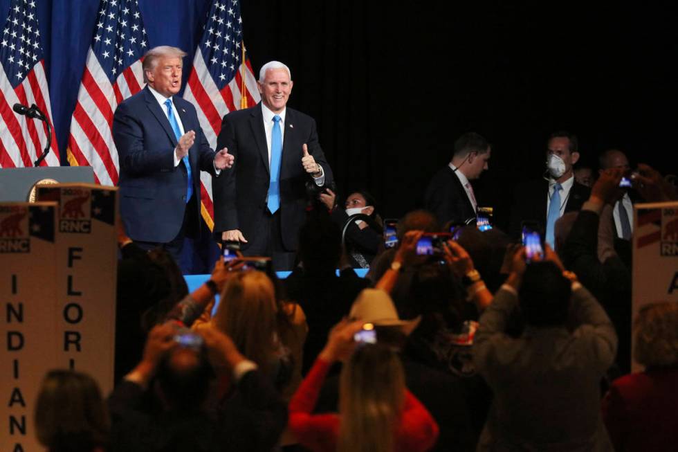 President Donald Trump and Vice President Mike Pence give a thumbs up after speaking during the ...